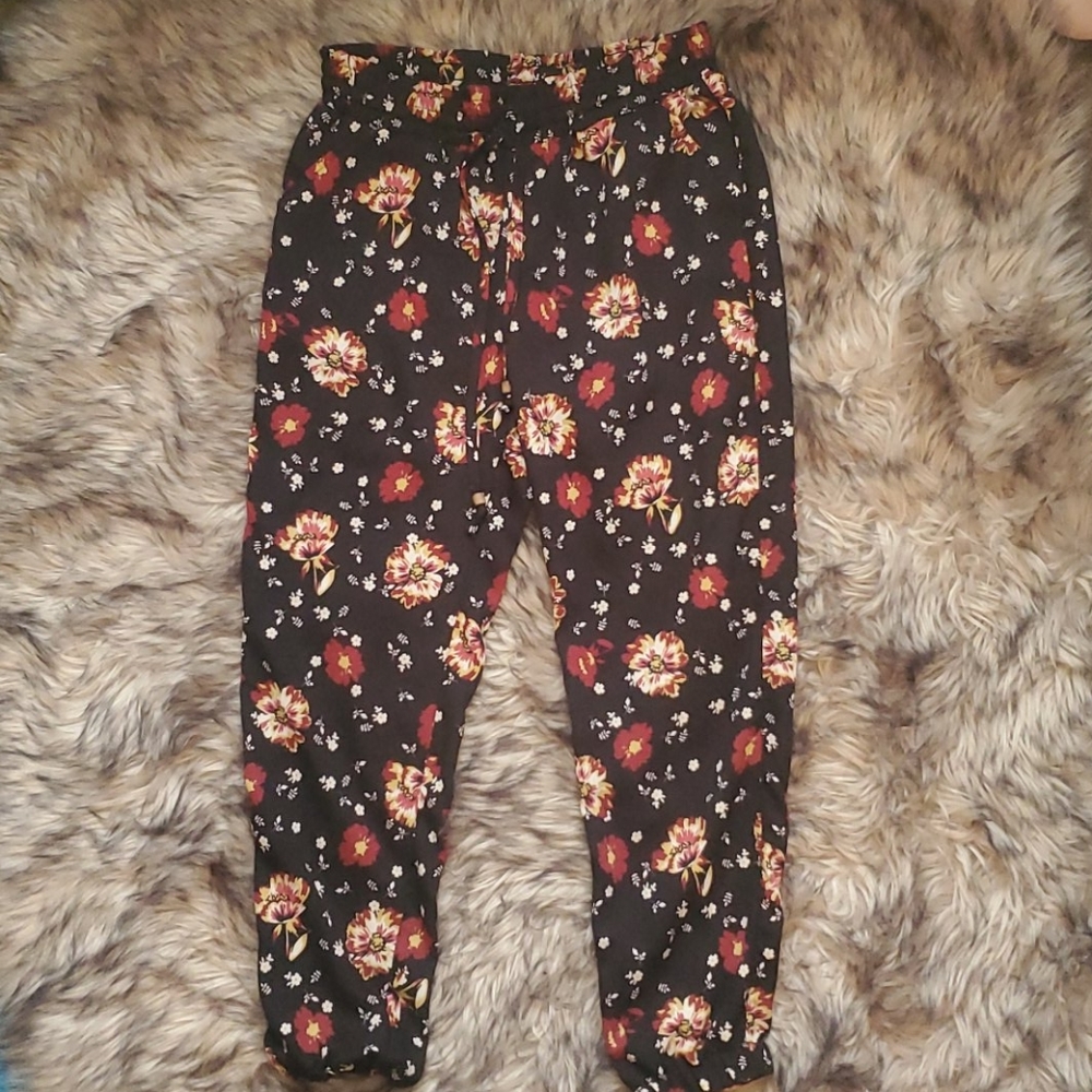 Black and burgundy floral pants with pockets
